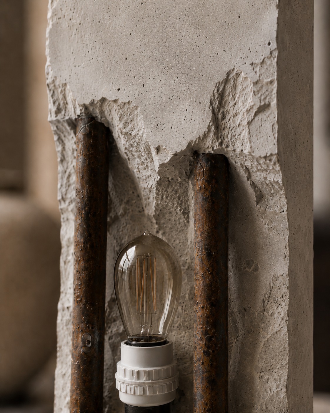 Very close material detail of chipped handcrafted concrete and rusted steel